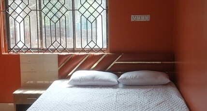 PRIME INN GUEST HOUSE Room Type - Deluxe Triple Room - AC