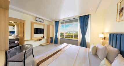 Breeze By Patron Hotels Room Type - Deluxe Room Ground Floor Breeze By Patron Hotels Room Type - Deluxe Room Ground Floor