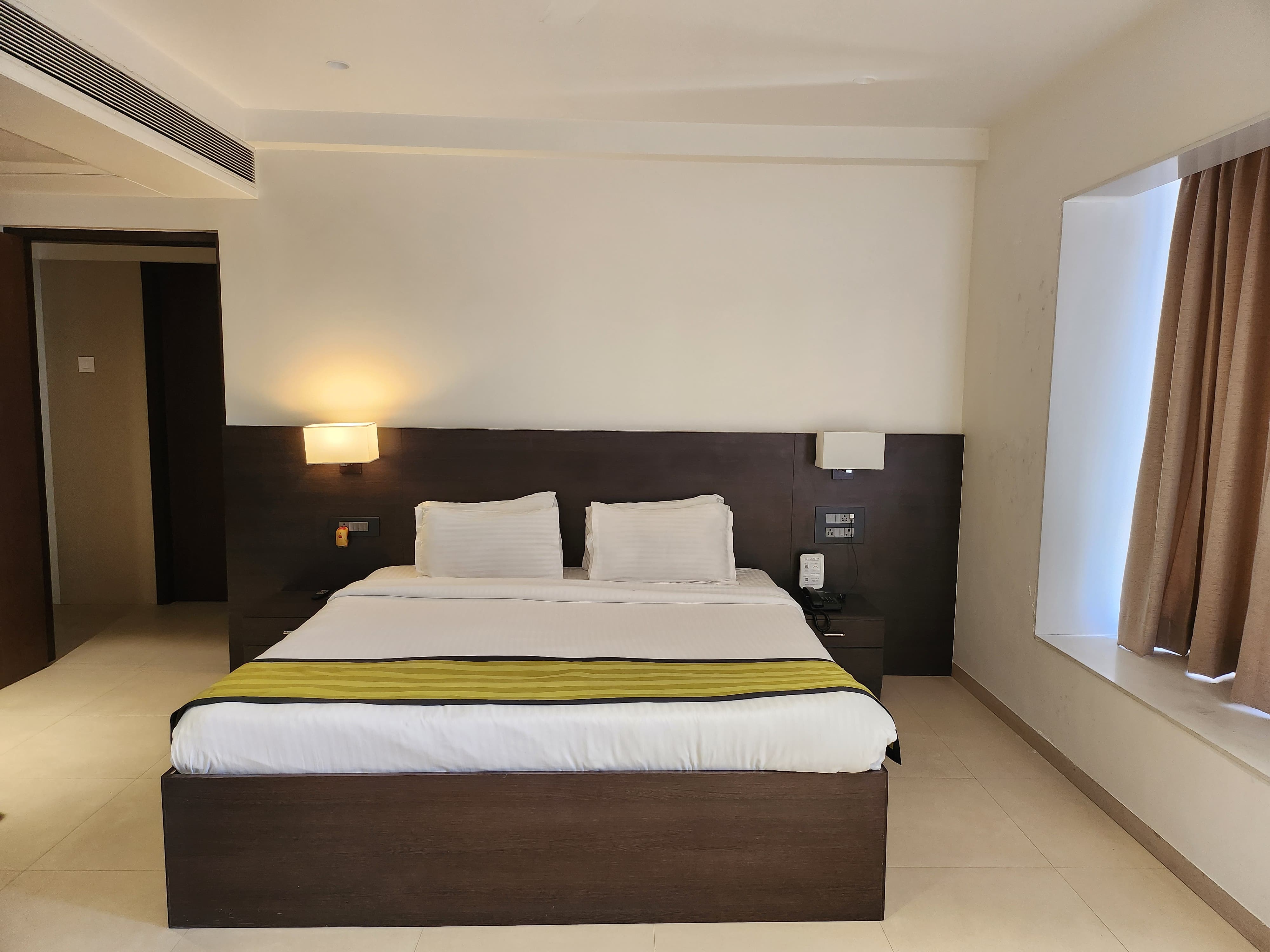 Freesia Residency by Express Inn - Tap to explore photos