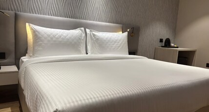 Ambeshwari Grand Hotel Room Type - Superior Room With City View