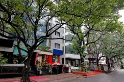 Capital O Elegant Amethyst Business Hotel Near Ragigudda Sri Prasanna Anjaneyaswamy Temple