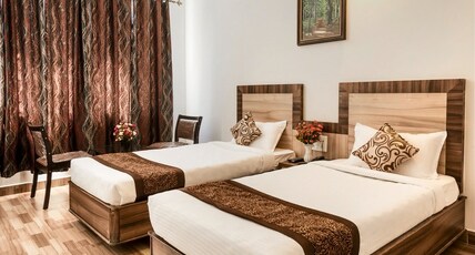 RG Hotel And Resorts Room Type - Deluxe Room 