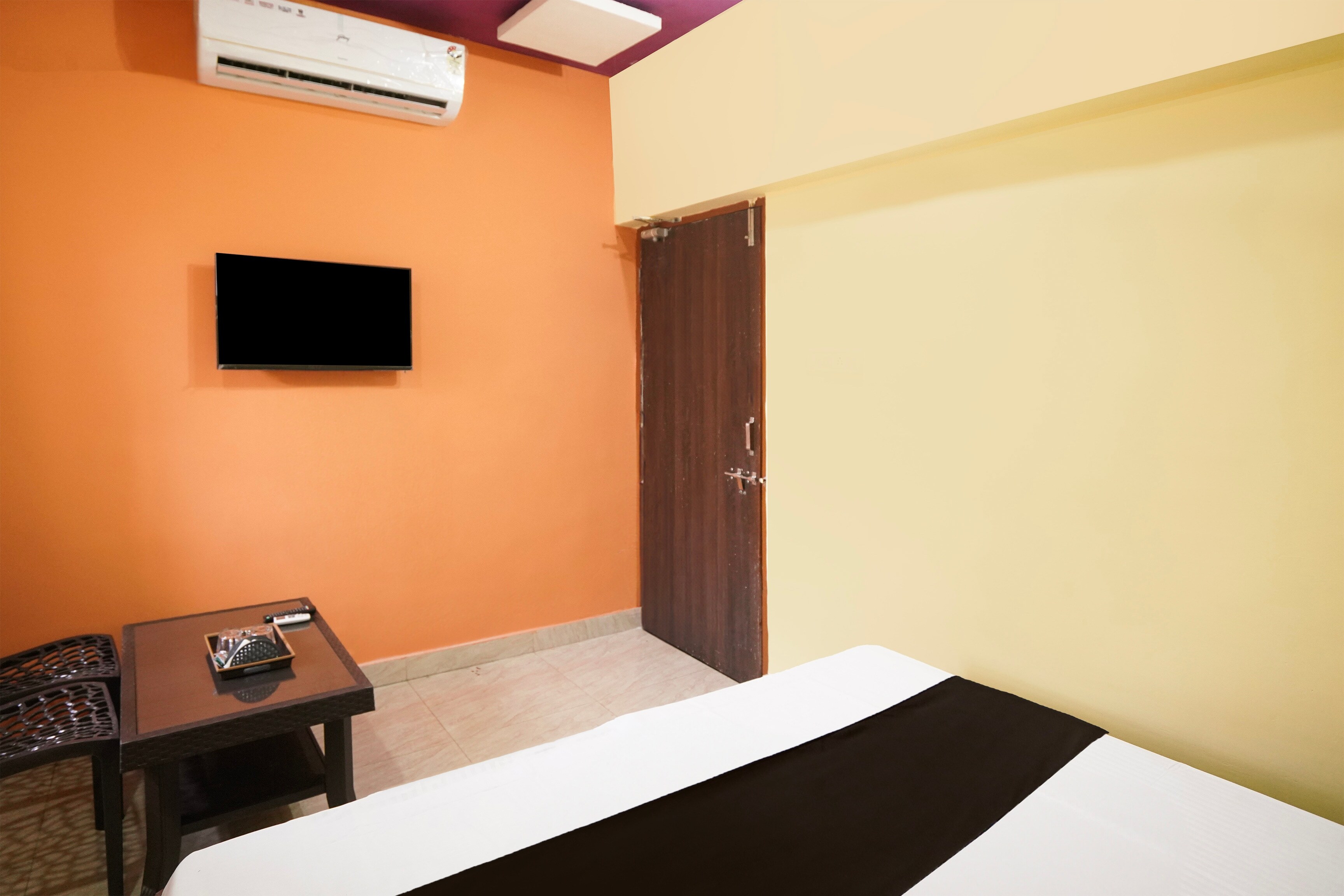 Hotel O Happy Hotel - Tap to explore photos