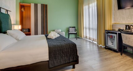 Best Western Plus CHC Florence Room Type - Apartment - 2 Rooms 5 Beds, One Queen Bed, Four Single Beds, 1 Bathroom Best Western Plus CHC Florence Room Type - Apartment - 2 Rooms 5 Beds, One Queen Bed, Four Single Beds, 1 Bathroom