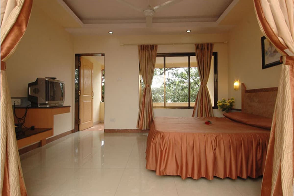 Rajesh Hotel - Tap to explore photos