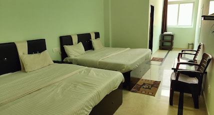 Hotel & Restaurant Blue Orchid Room Type - Family AC Deluxe Room Hotel & Restaurant Blue Orchid Room Type - Family AC Deluxe Room