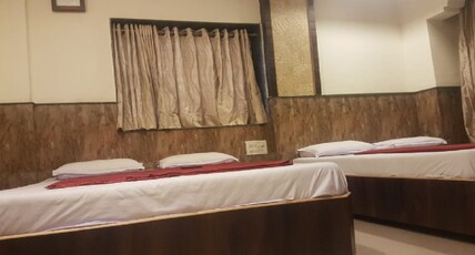 HOTEL SAI VANAPALLY RESIDENCY Room Type - Standard Family Four Bed NON AC Room HOTEL SAI VANAPALLY RESIDENCY Room Type - Standard Family Four Bed NON AC Room