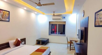 Abhiram hotels & resorts Room Type - Double Deluxe Room