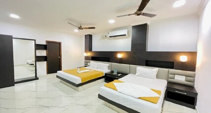 NEELESH TOWERS Room Type - DELUXE TRIPLE AC ROOM