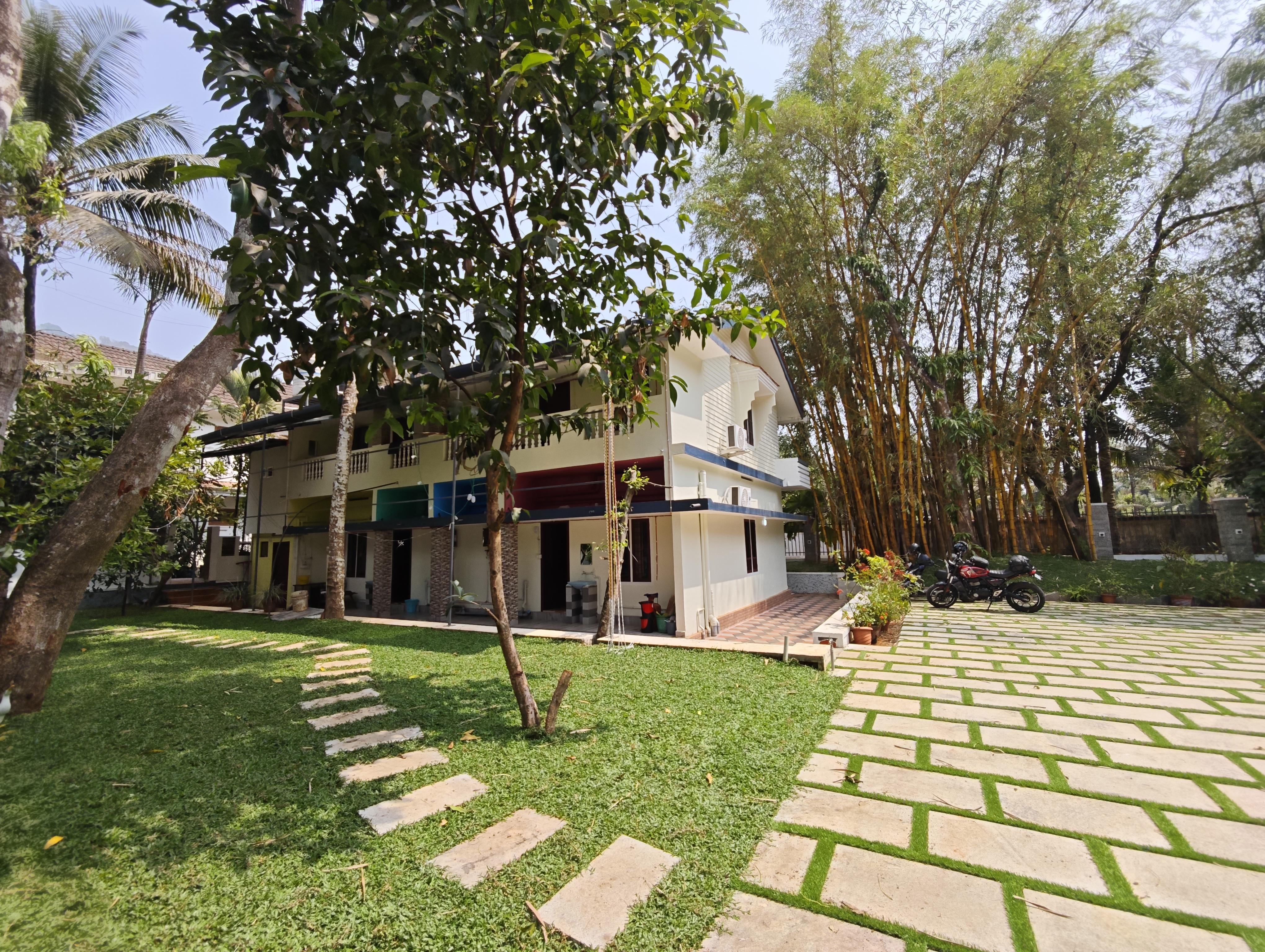 Porte De Munnar Family Cottage - Tap to explore photos