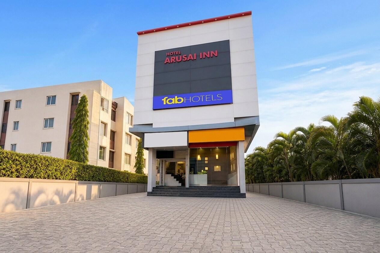 FabHotel Arusai Inn - Tap to explore photos
