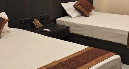 HOTEL PRATYAKSH DARSHAN Room Type - Twin Bed