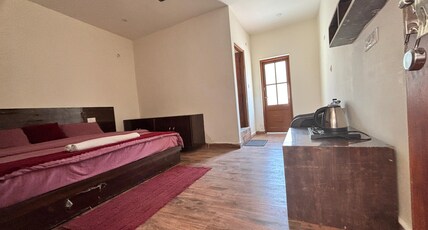 Hotel Atharva Villas Room Type - Deluxe Triple Bed Room Without Balcony