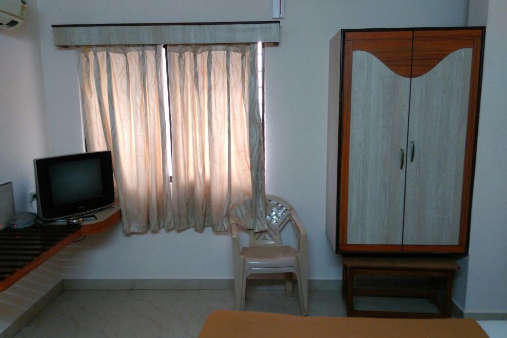 i-ROOMZ Amrutha Residency - Tap to explore photos