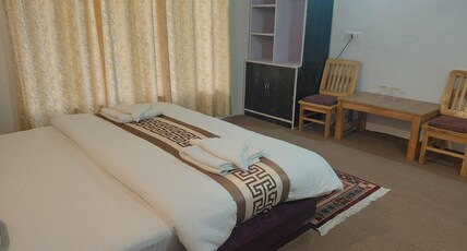 Gaskit residency Room Type - Bedroom 102