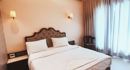 UDUPI TO MUMBAI (TRIVENI RESIDANCY) Room Type - Luxury Double Bed Room with Temple View