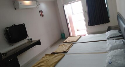 i-Roomz Hoysala Residency Room Type - Deluxe Triple Bed AC Room