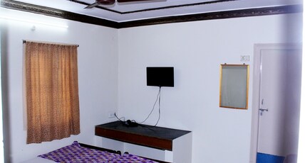 ARUNA RESIDENCY Room Type - DELUXE ROOM
