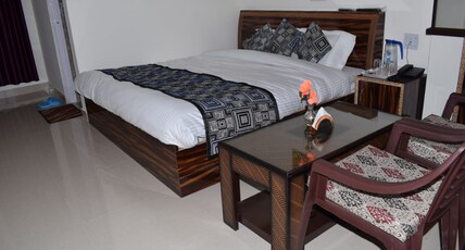 Bhavik Palace | Rooms with Views Room Type - Deluxe Room with Mountain View