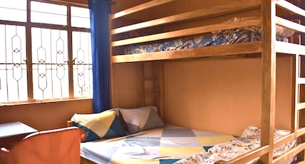 Elysian Home Food & Stay Room Type - D: Compact Queen Bunk with balcony Elysian Home Food & Stay Room Type - D: Compact Queen Bunk with balcony