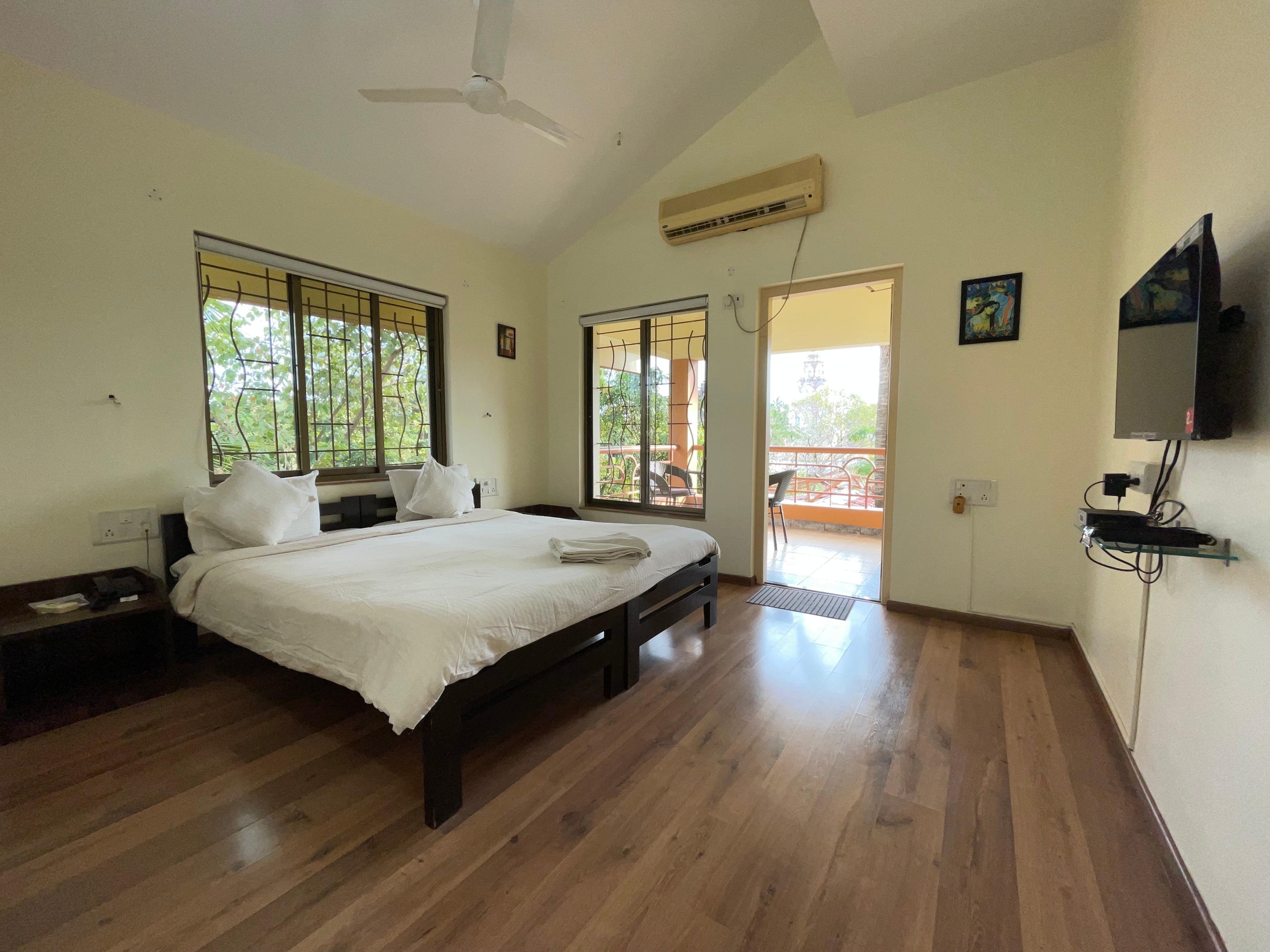 The Mango Villa | Rooms & Wi-Fi - Tap to explore photos