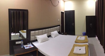 Hotel Om Executive  Room Type - Deluxe Room A/c