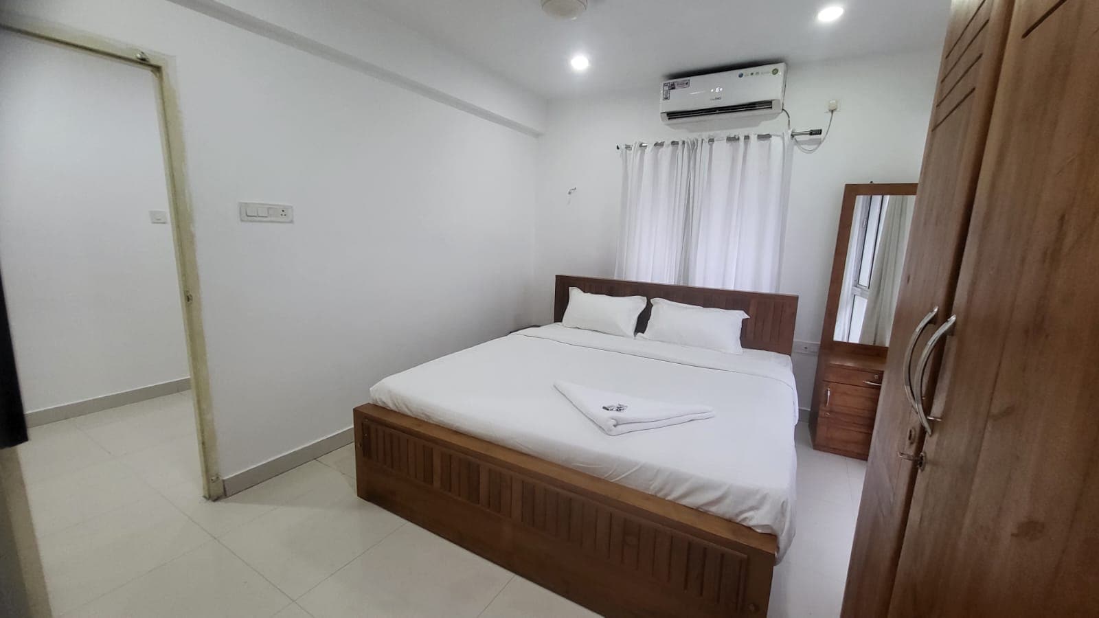 Le Mansion Suites Edappally - Tap to explore photos