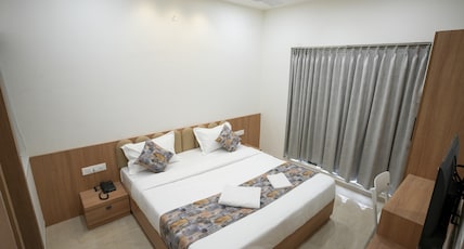 MARUTI GRAND HOTEL Room Type - Comfort Room