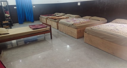 Aathishaya Inn Room Type - Dormitory ( 15 PAX ) Aathishaya Inn Room Type - Dormitory ( 15 PAX )
