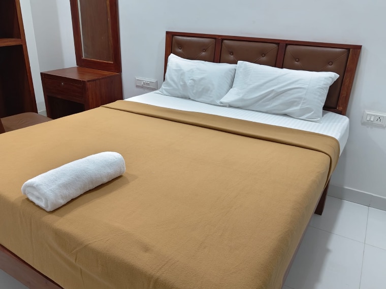 Ghala Residency near Thalassery Beach - Tap to explore photos
