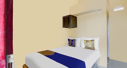 Hotel O Kost 2 Putra Syariah Room Type - SPOT ON NON AC double
