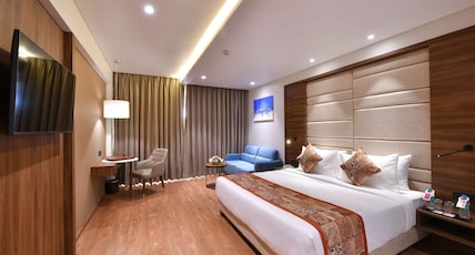 Regenta Fairlark Vadodara Room Type - Club Room + One way Airport or Railway Station Transfer (Subject to availability requires a minimum Regenta Fairlark Vadodara Room Type - Club Room + One way Airport or Railway Station Transfer (Subject to availability requires a minimum