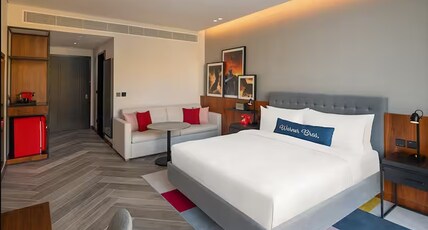 The WB Abu Dhabi, Curio Collection by Hilton - Free Theme Park Tickets Room Type - King Artist Room With Pool View With Theme Park Access The WB Abu Dhabi, Curio Collection by Hilton - Free Theme Park Tickets Room Type - King Artist Room With Pool View With Theme Park Access