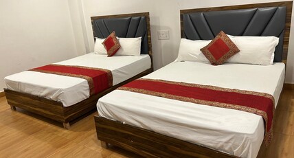 Lotus inn Room Type - Deluxe Room - AC