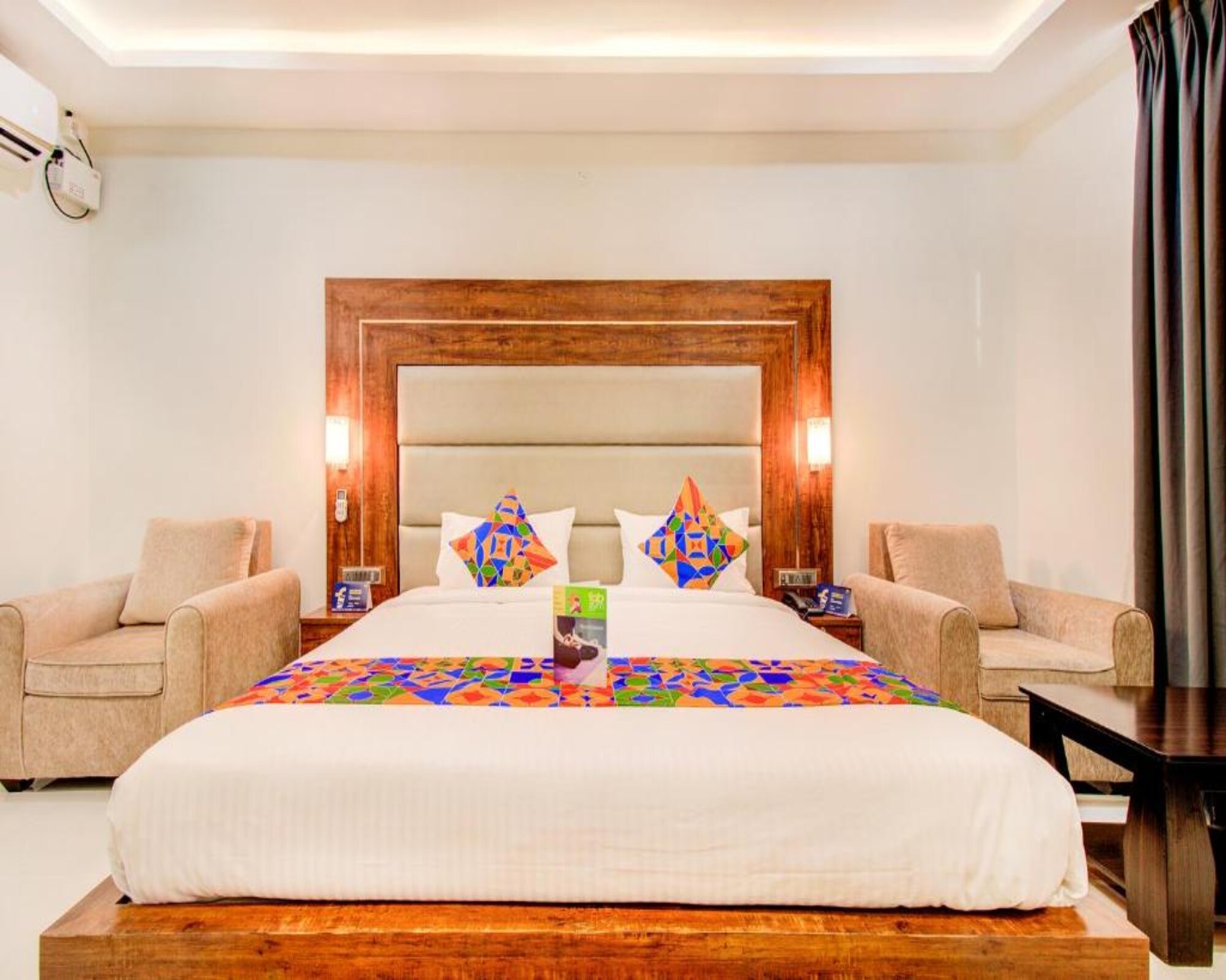 FabHotel Prime The Royal Suites - Nr. Gopalan Innovation Mall - Tap to explore photos