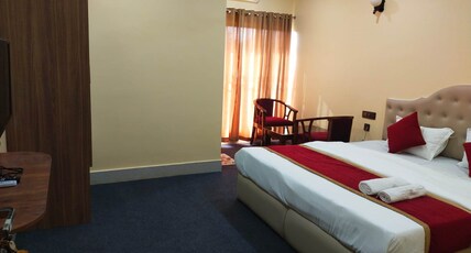Maa Paradise World Room Type - Deluxe room