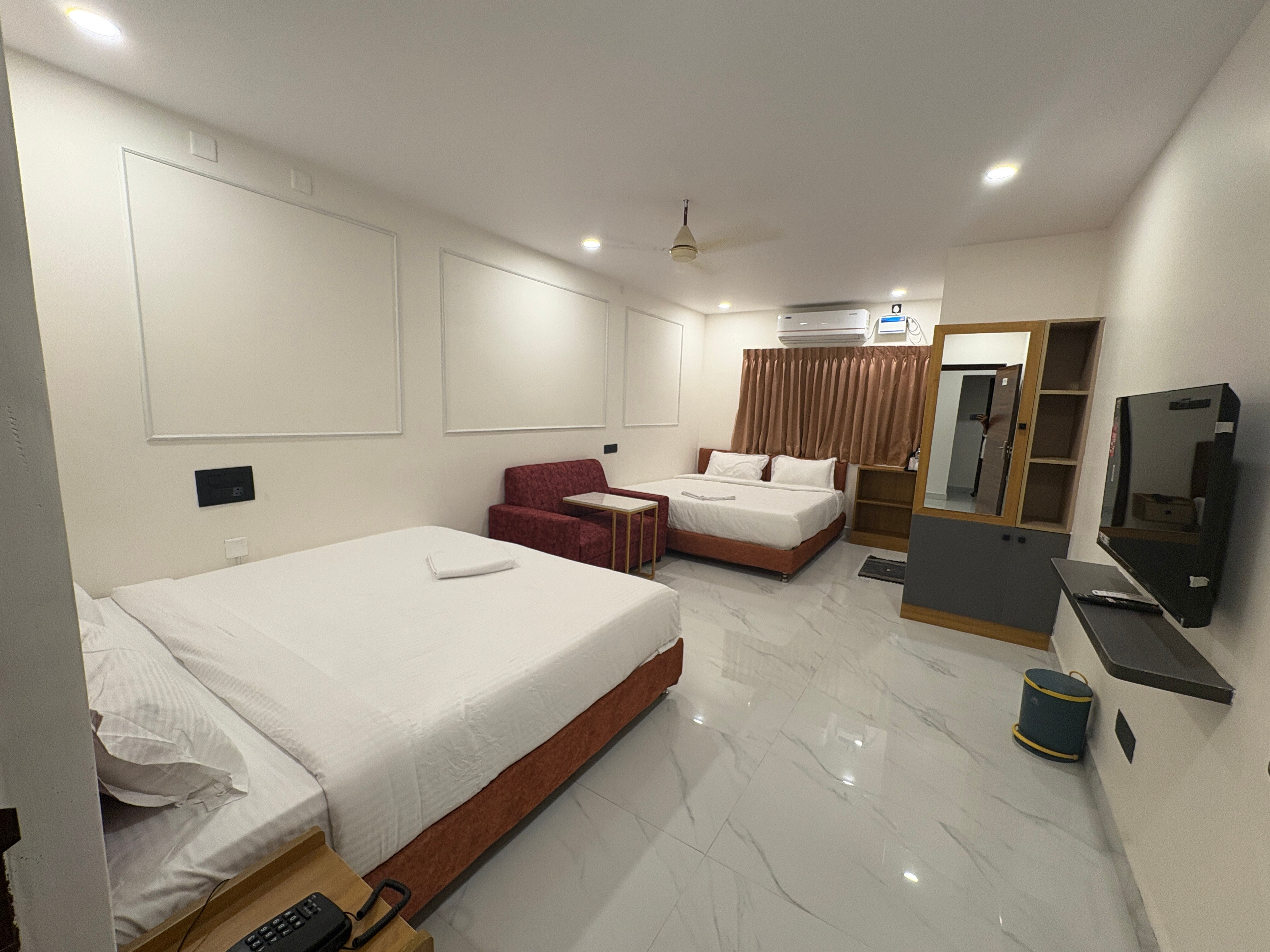 Hotel Dhanwik - Tap to explore photos