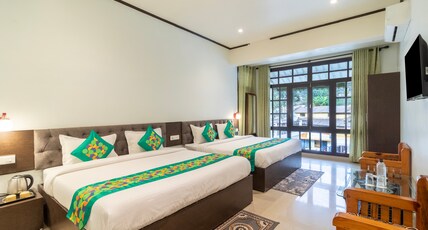Treebo Spring Birds - 3Kms From Bhimtal Lake Room Type - Superior Family Room