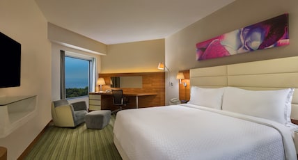 Four Points By Sheraton, Visakhapatnam- Marriott International Room Type - 1 King Bed, Pool View, Balcony, Suite Four Points By Sheraton, Visakhapatnam- Marriott International Room Type - 1 King Bed, Pool View, Balcony, Suite