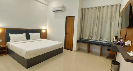 Shri Ram Portico Room Type - Deluxe Double Room