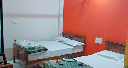 COORG CITY SCENERY HOMESTAY. Room Type - Deluxe Non AC Family Room 1