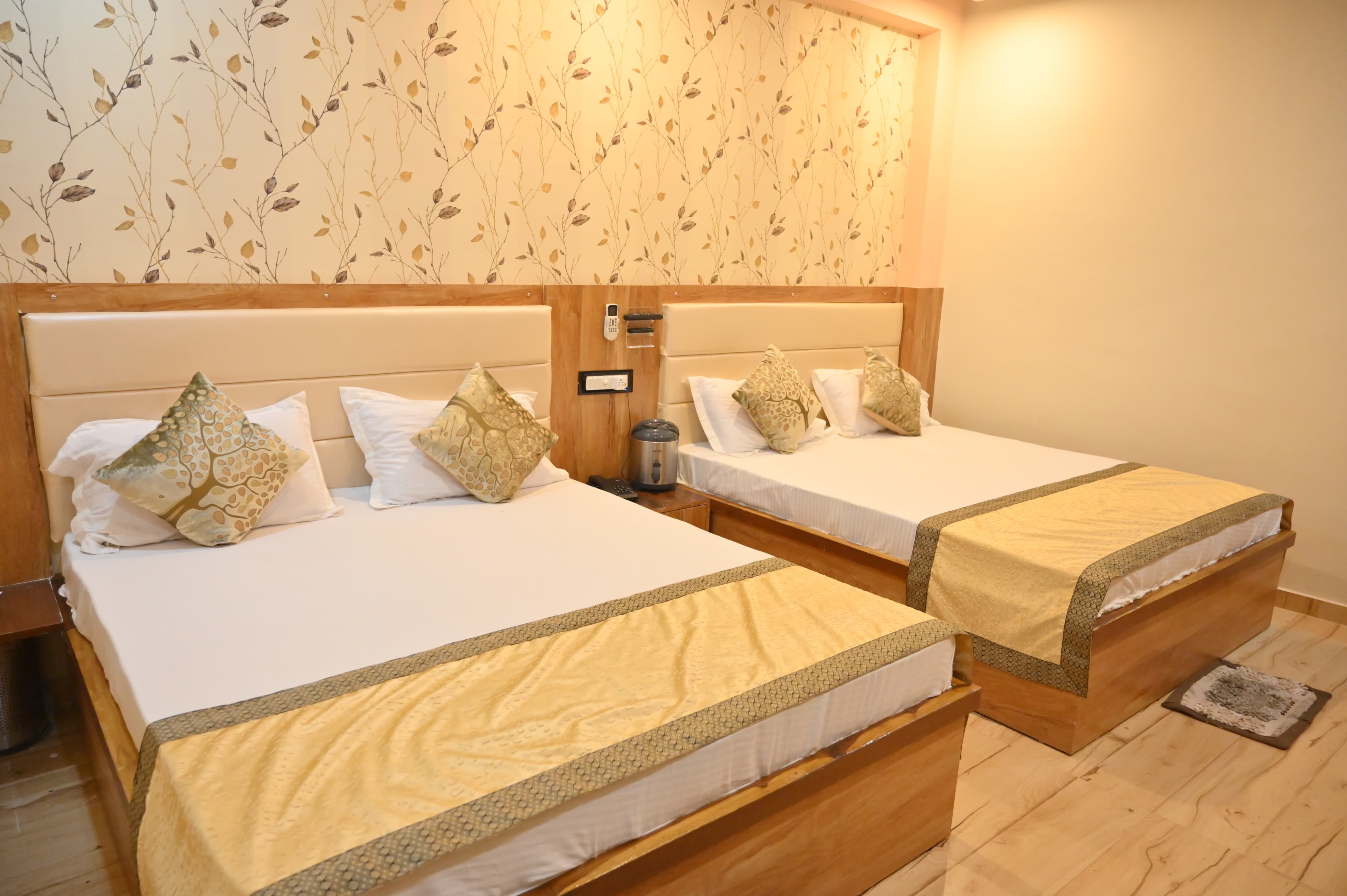 New Hotel Prem - Tap to explore photos