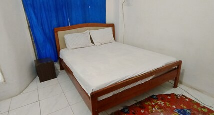 Hotel O Losmen Griya Mulia Katingan Kuala Room Type - Indonesia Standard Double