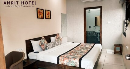 AMRIT HOTEL Room Type - AC EXECUTIVE DELUXE SANITIZED  ROOM WITH KING BEDS