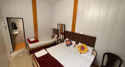 HosteLaVie | Om Home Guest House Room Type - TRIPLE BED ROOM WITH AIRCONDITION
