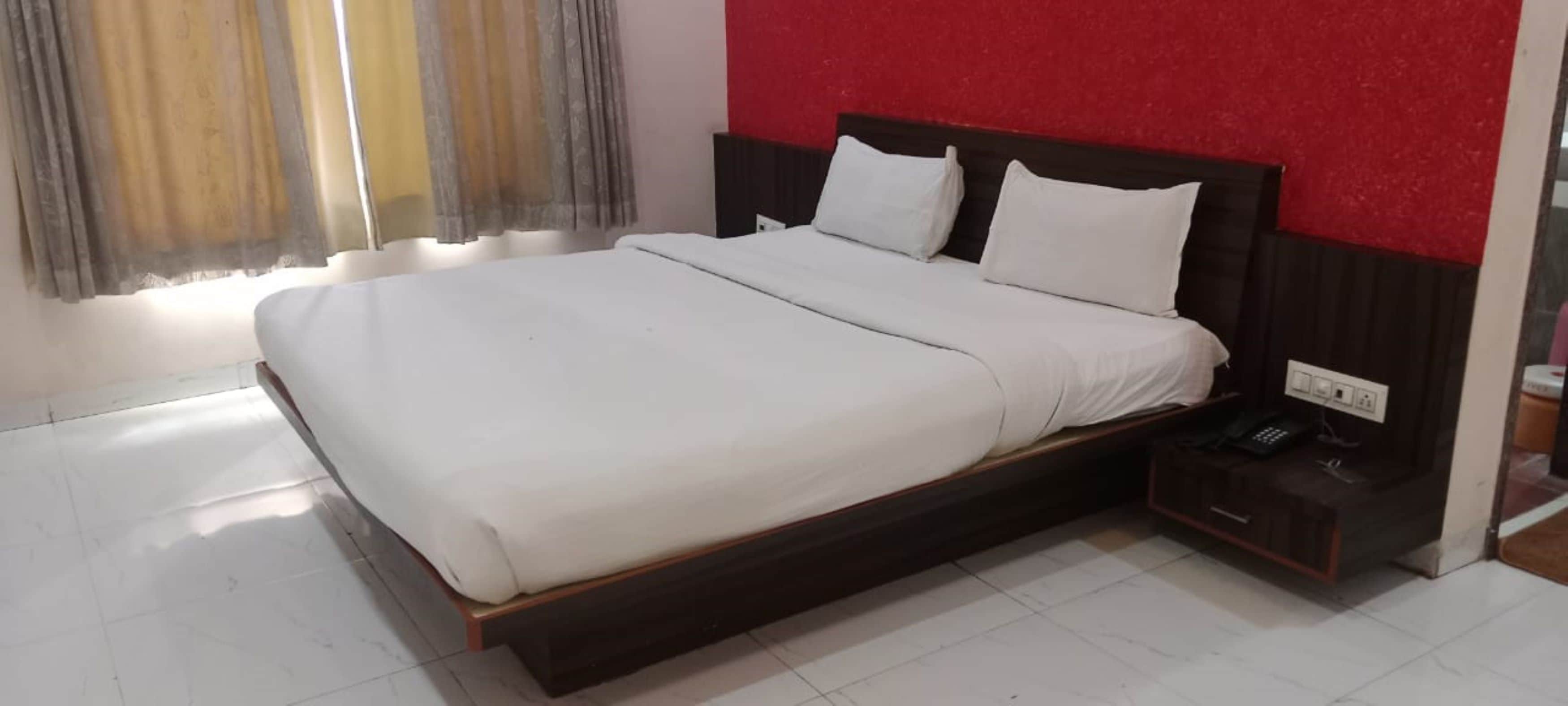 Hotel Swamiraj Executive - Tap to explore photos