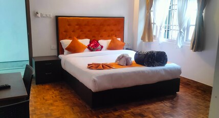 Hotel 9 Atop - 5 mins to MG Marg Room Type - Signature Deluxe Road Facing Hotel 9 Atop - 5 mins to MG Marg Room Type - Signature Deluxe Road Facing