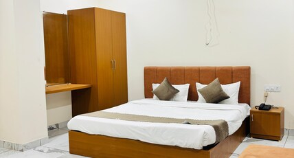 HOTEL VENUS STAYS Room Type - Super Deluxe Room with Balcony
