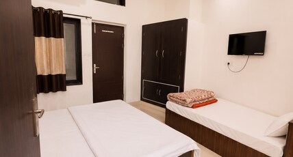 Radha Krishna Hotel Room Type - Deluxe Triple AC Room