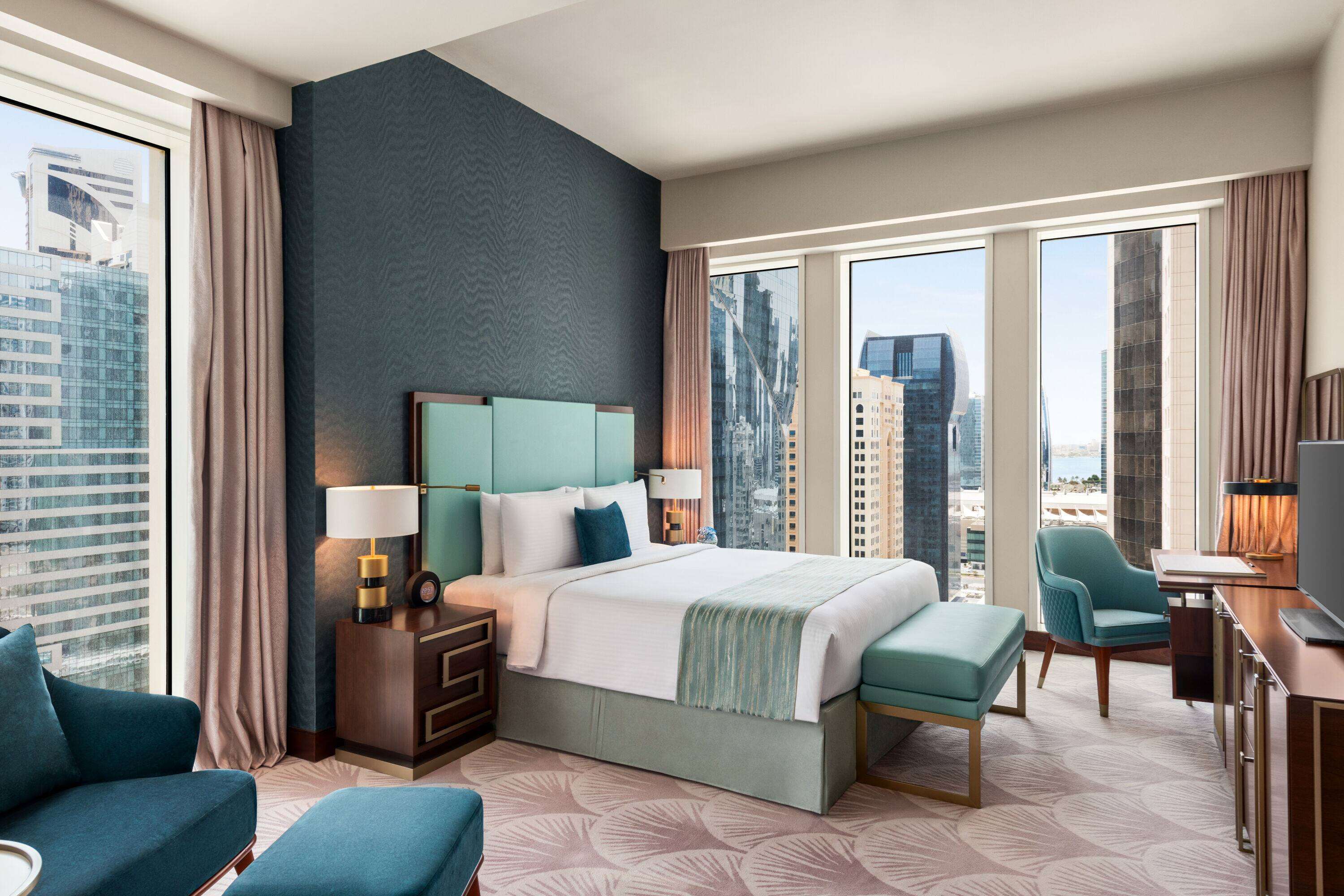 Wyndham Grand Doha West Bay Beach - Tap to explore photos